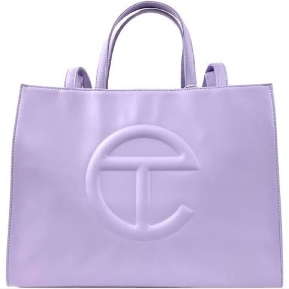 medium size lavender/purple telfar bag.